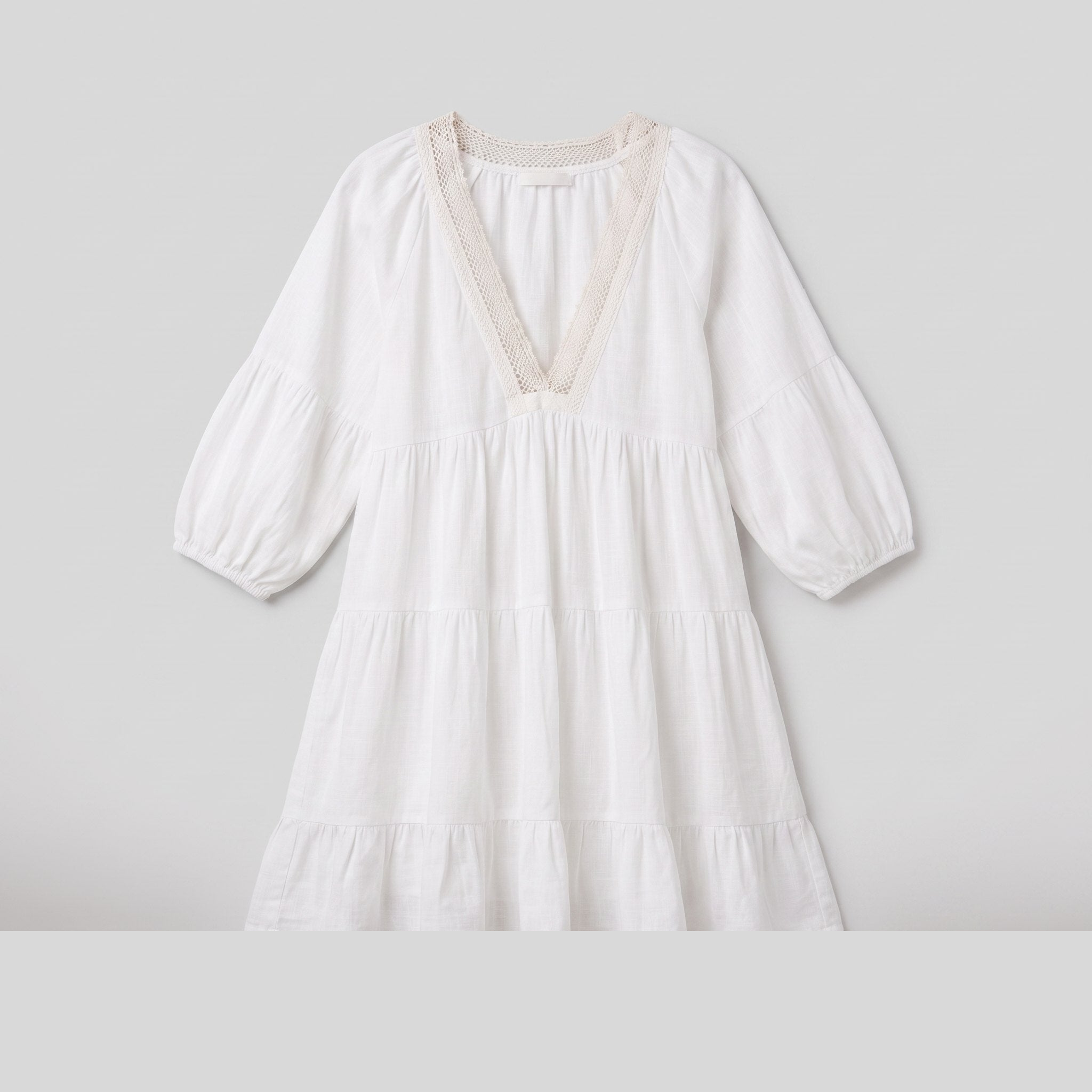 Bella cotton-linen lace V-neck mini dress in white, flat lay product shot