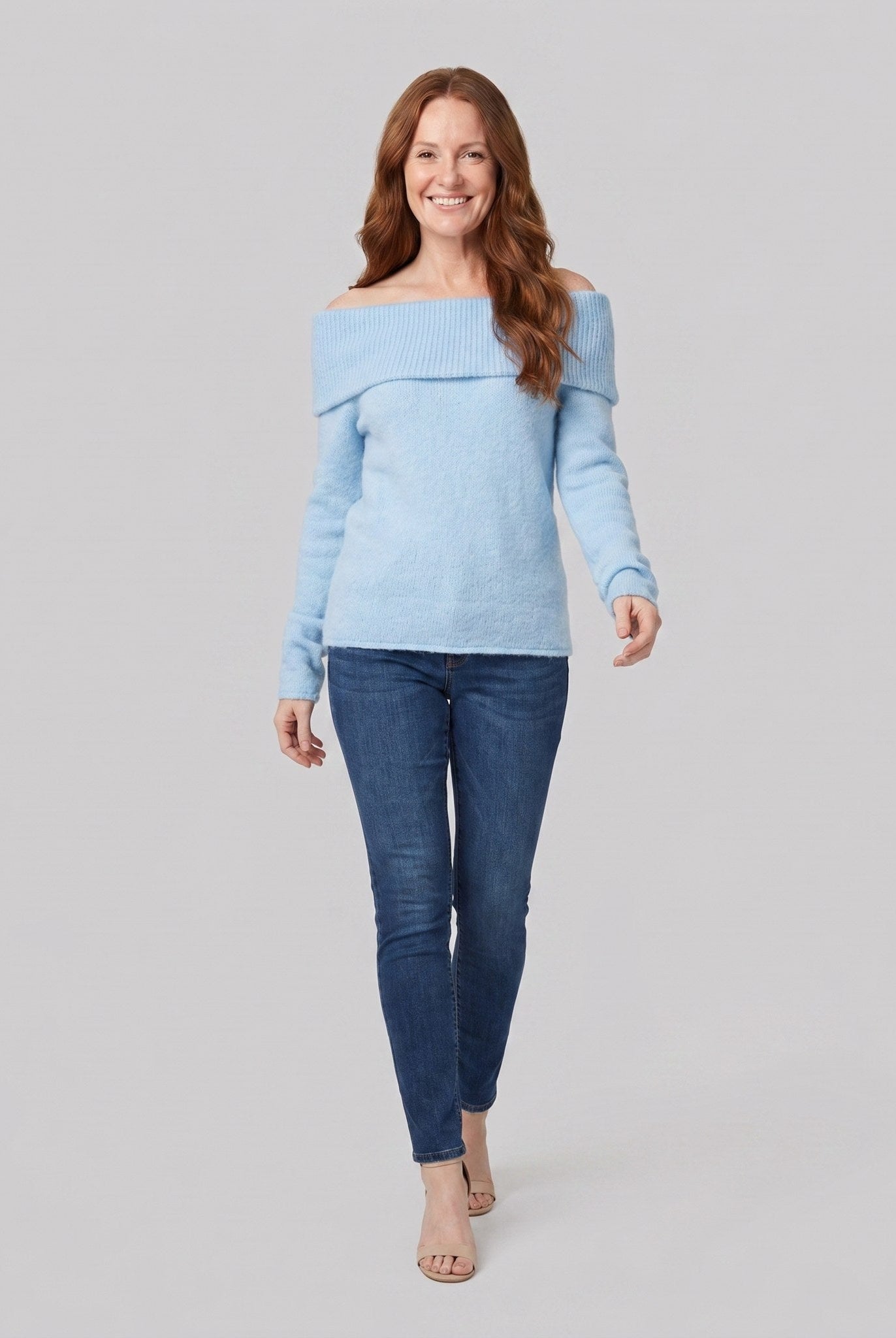 Clara off-shoulder knit top in light blue on model