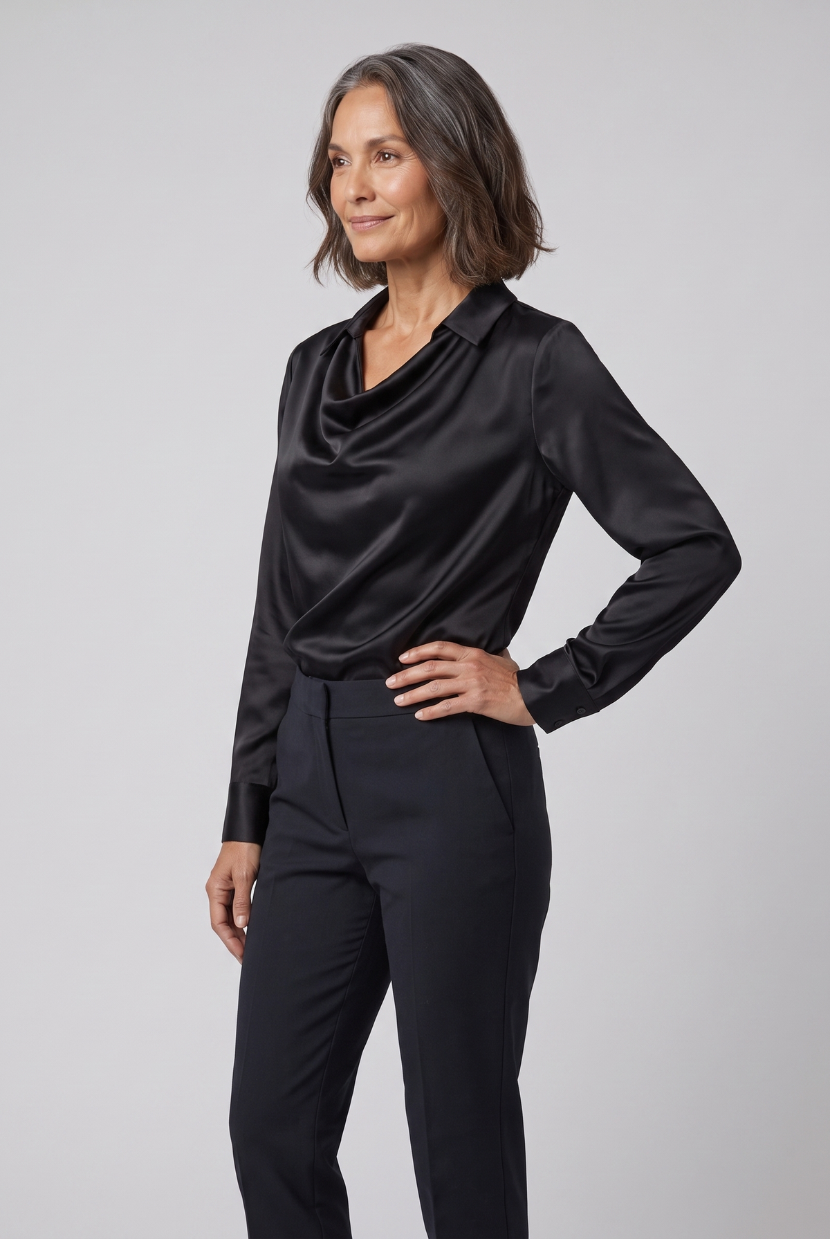 Dalia draped cowl-neck blouse in black on model