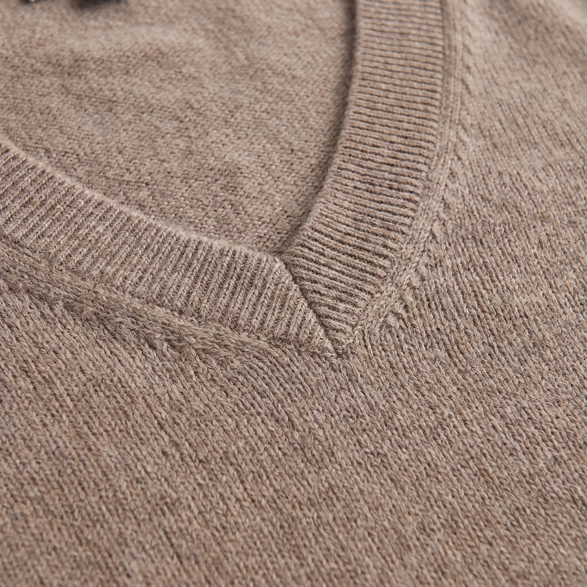 Elysia V-neck knit top neckline and knit texture close-up