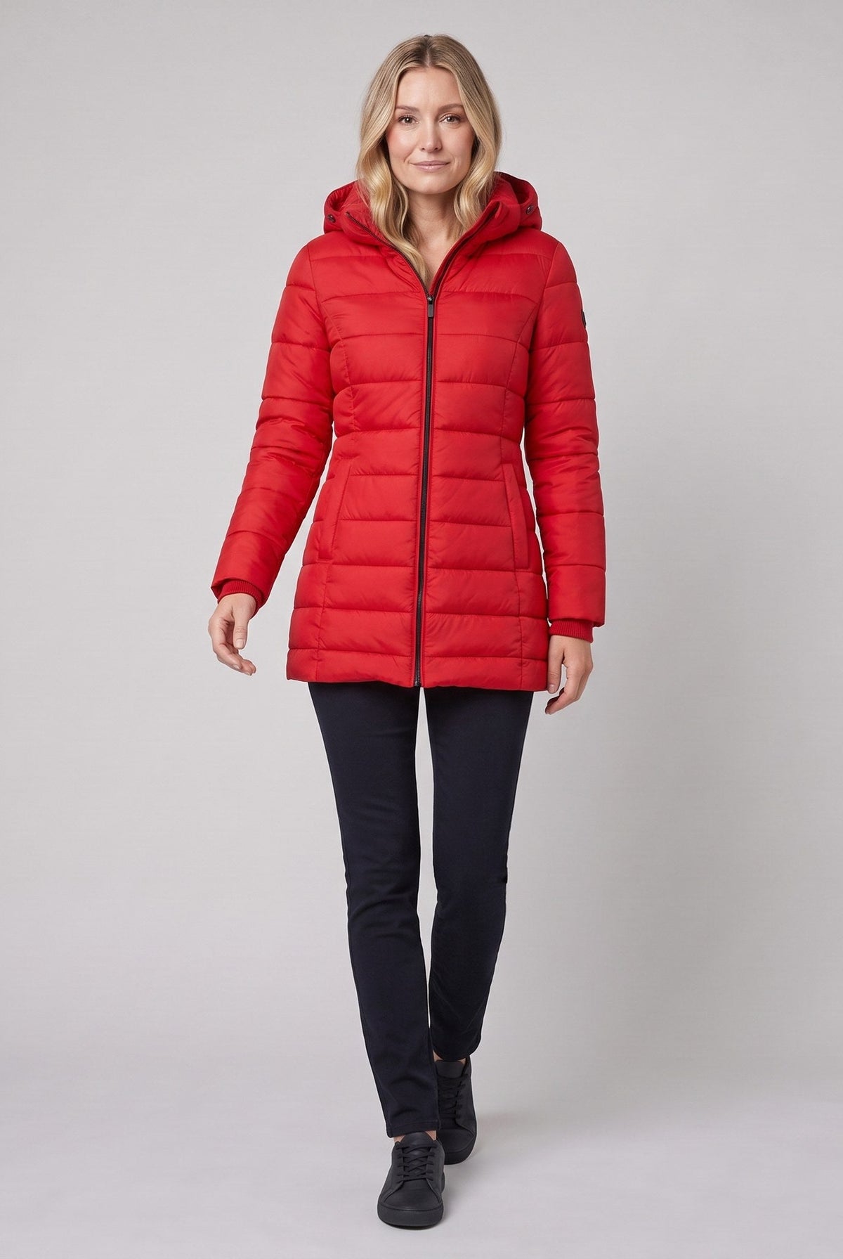 Evara lightweight hooded puffer jacket in red on model