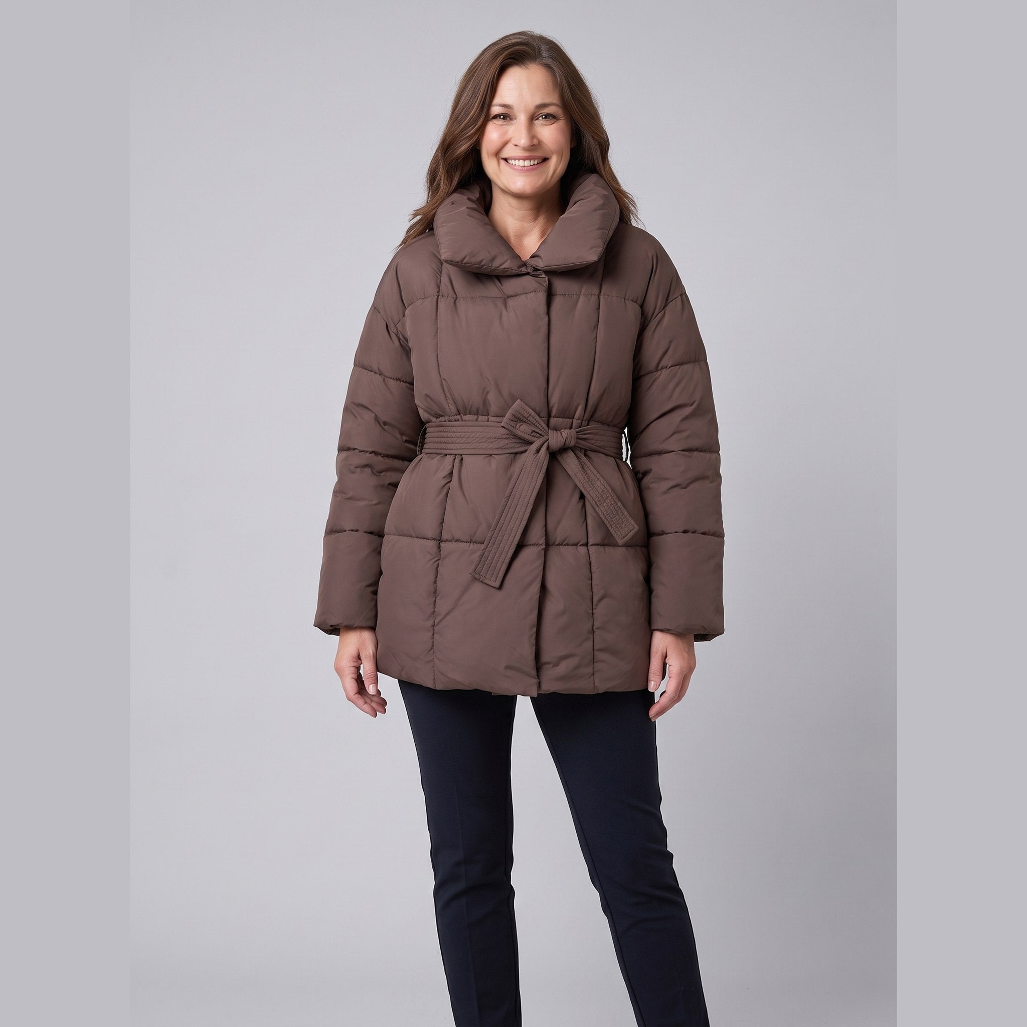 Haven belted puffer coat in brown on model
