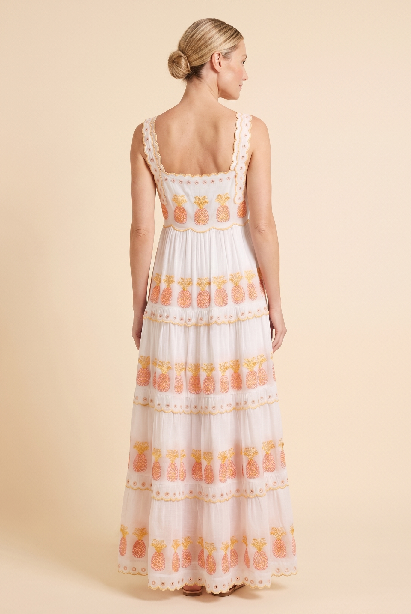 White square-neck tiered maxi dress with pineapple embroidery, back view on model