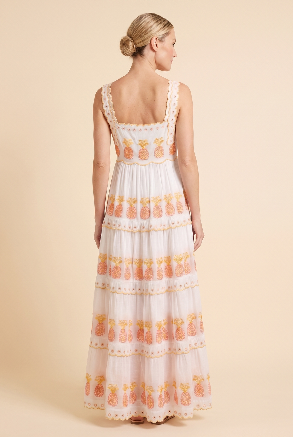 White square-neck tiered maxi dress with pineapple embroidery, back view on model
