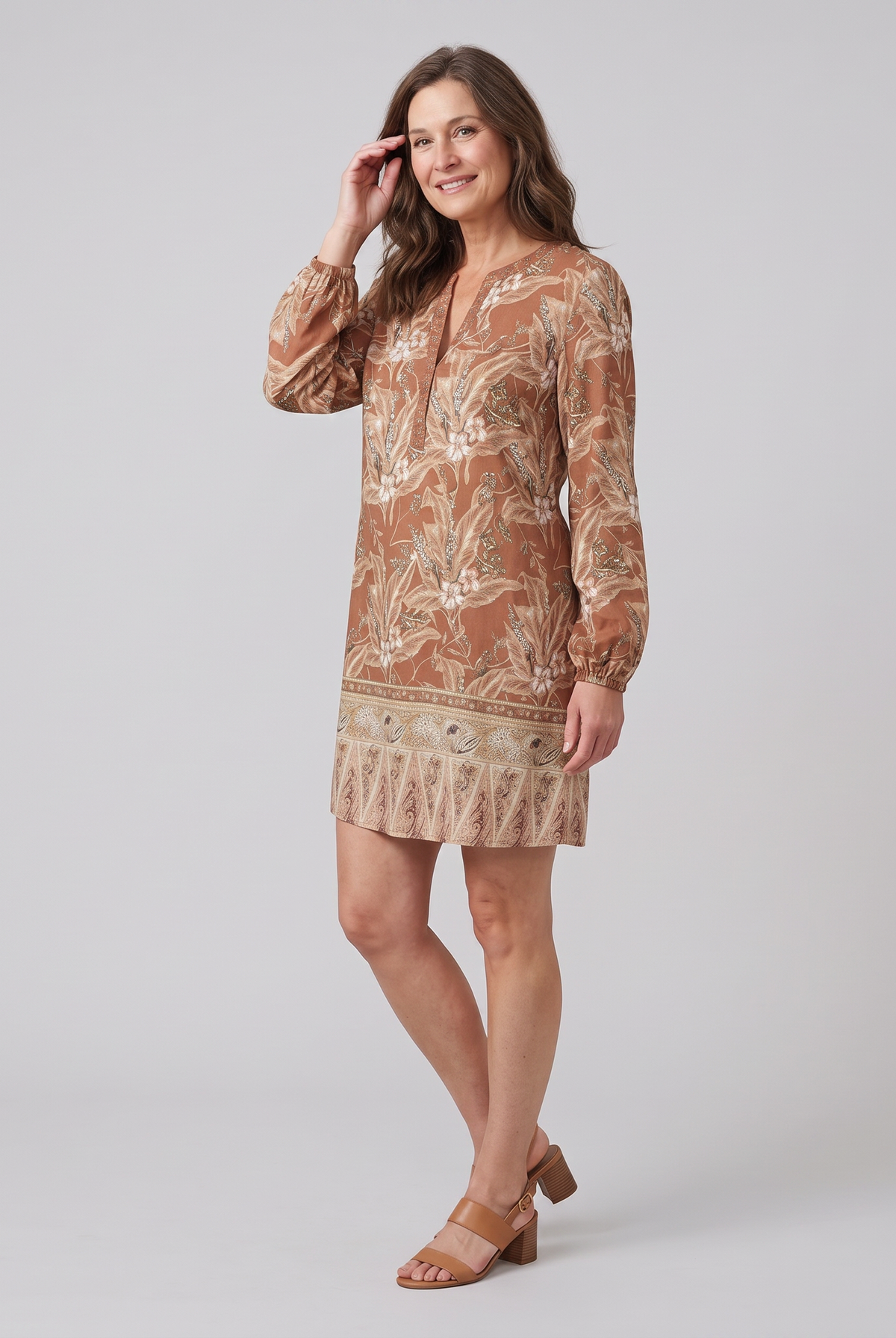 Brown floral shift mini dress, three-quarter side view on model
