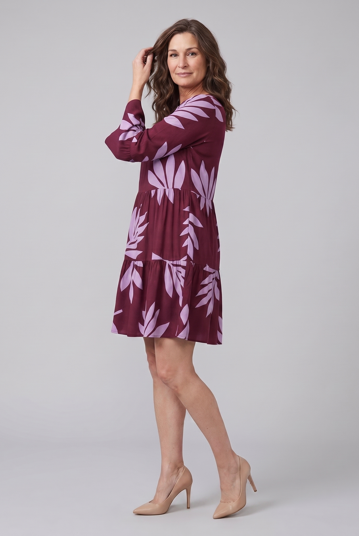 Kora Women's Dress bias cut tiered panels angled view on model