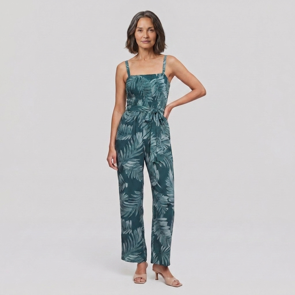 Women's teal spaghetti strap wide-leg jumpsuit with smocked bodice, front view on model