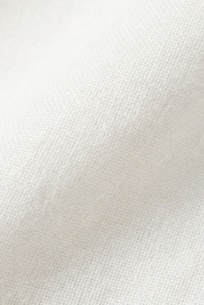 Women's White Peplum Sleeveless V-Neck Tie Front Top - Fabric Close-Up