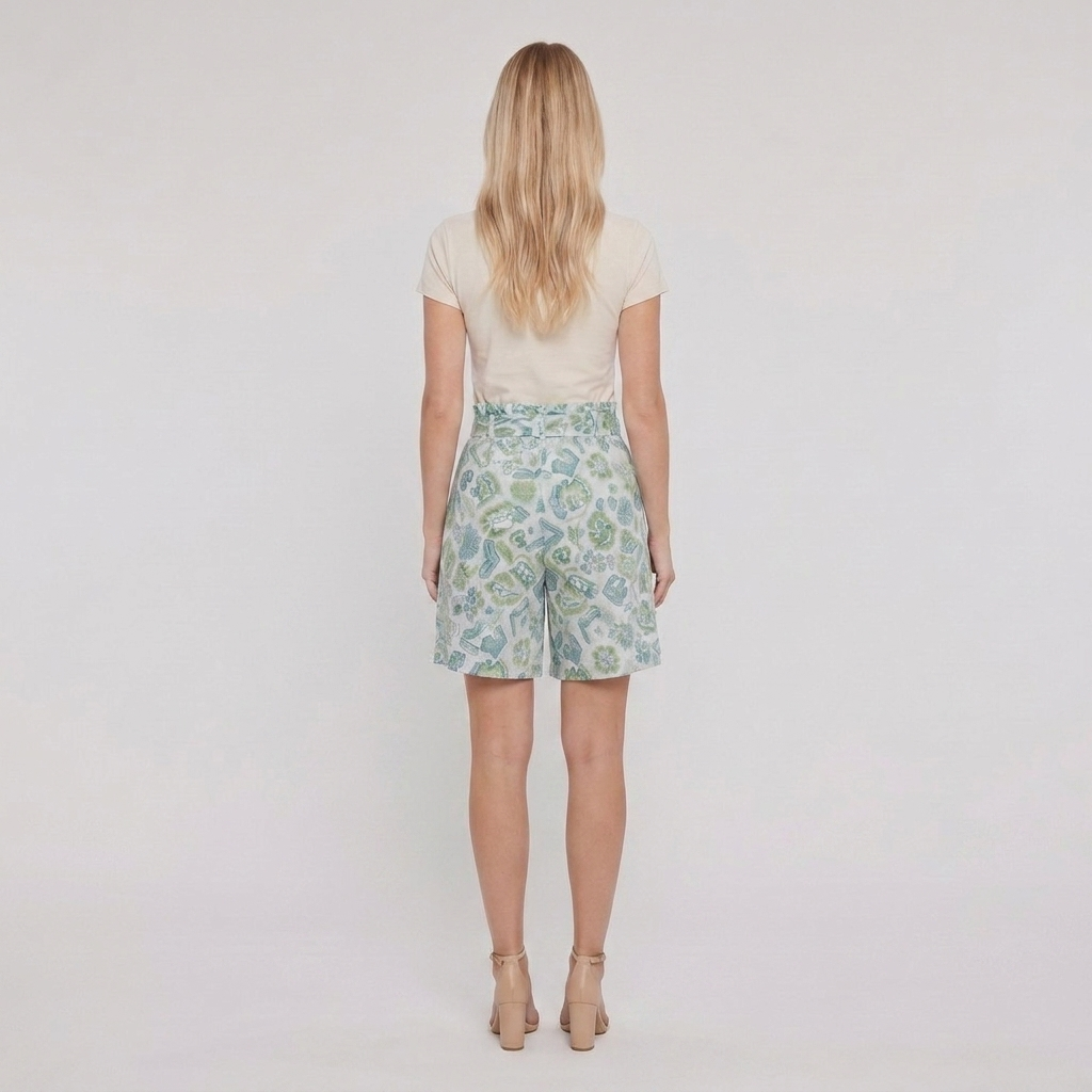 Pamela Boutique mint floral pleated shorts tie belt, model back view