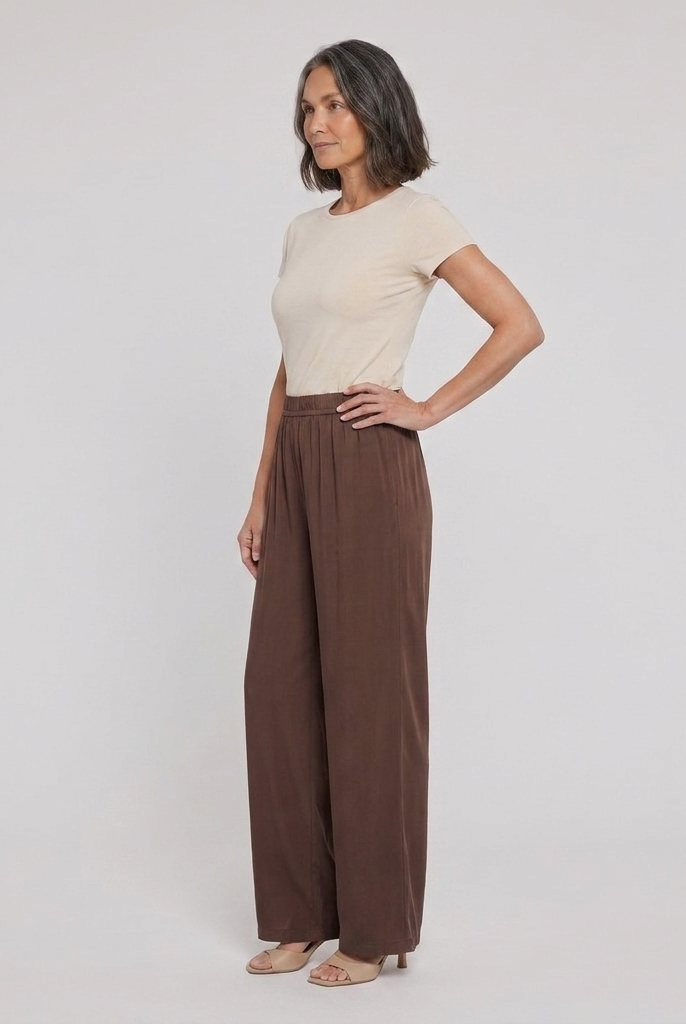 Pamela Boutique brown wide leg trousers, model side view