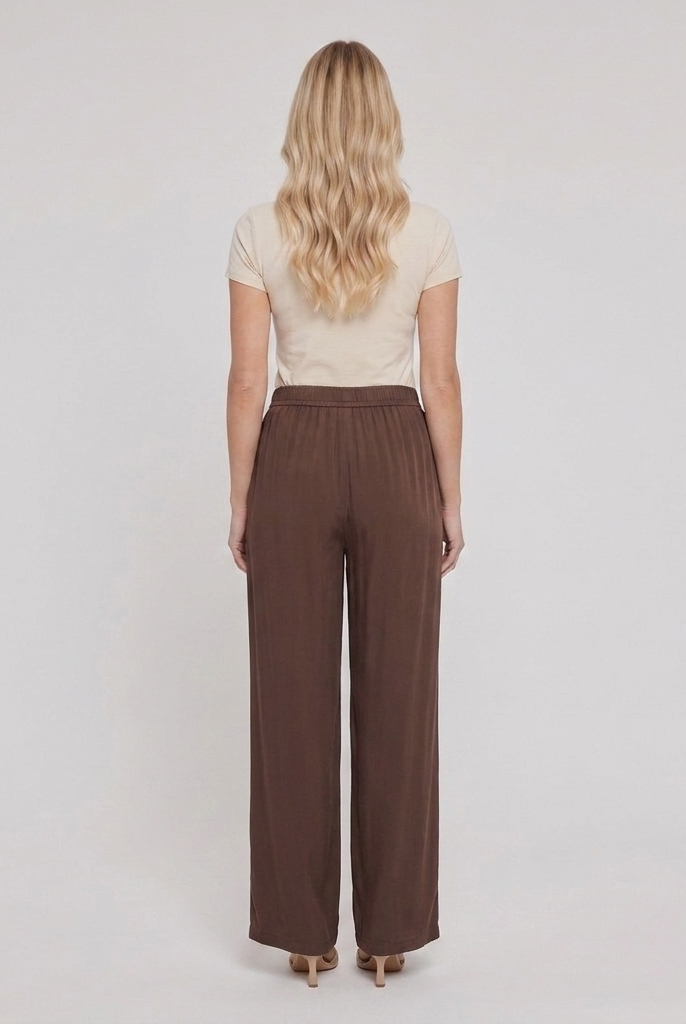 Pamela Boutique brown wide leg trousers, model back view