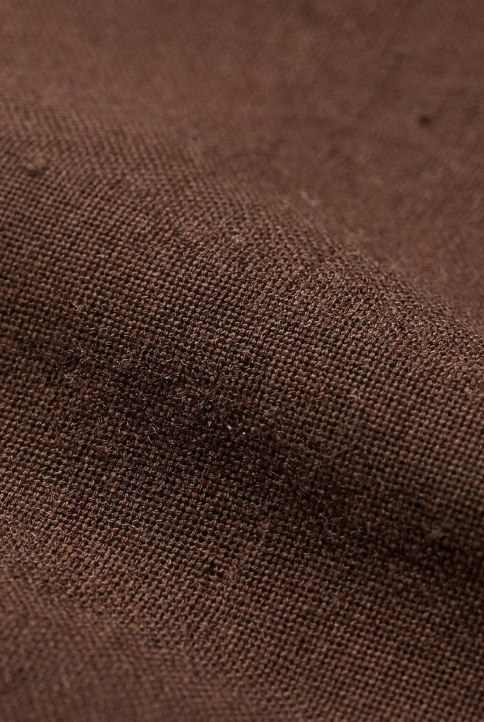 Pamela Boutique brown woven fabric texture close-up