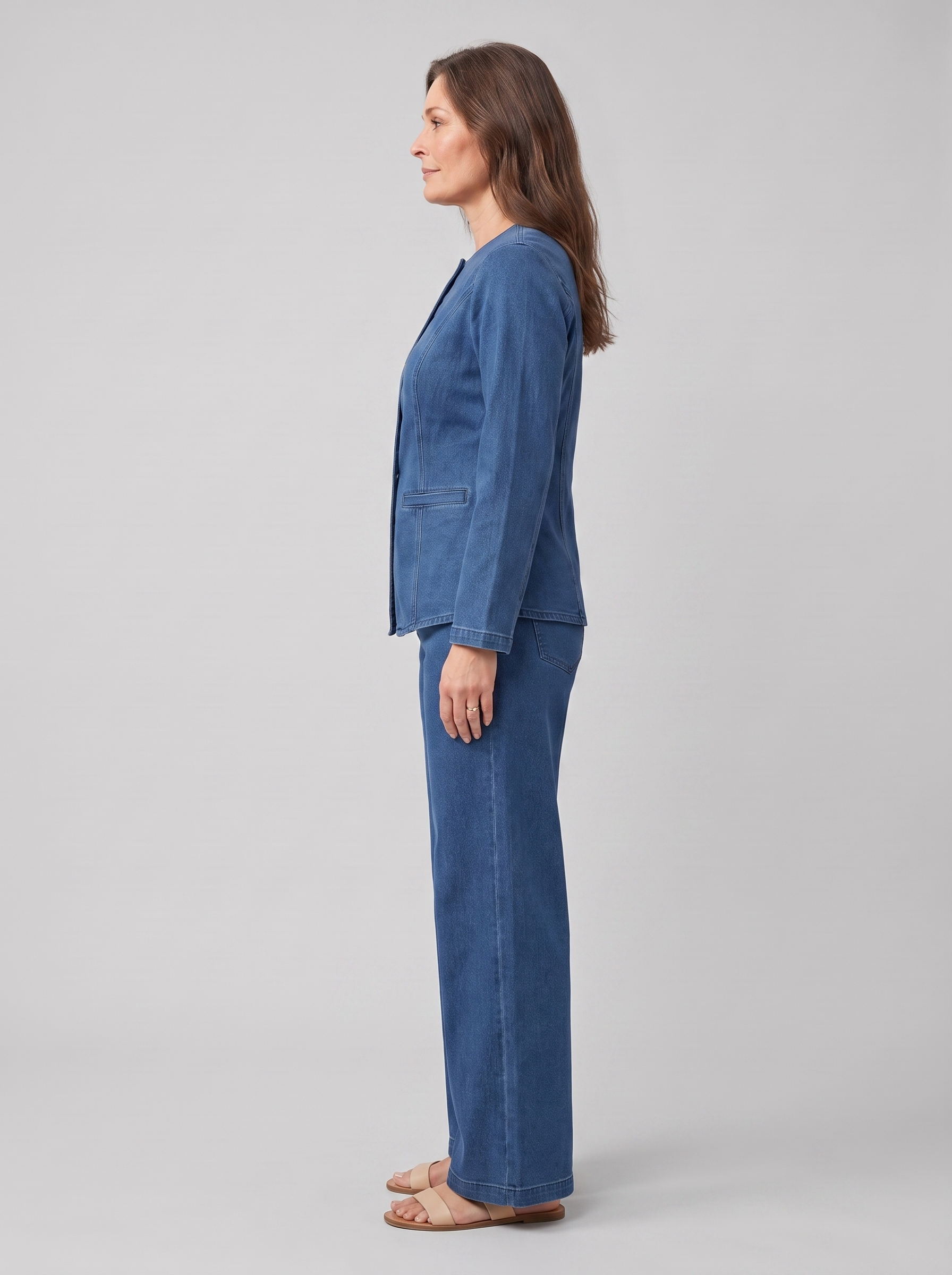 Indra collarless denim jacket and wide-leg trouser set, side view on model
