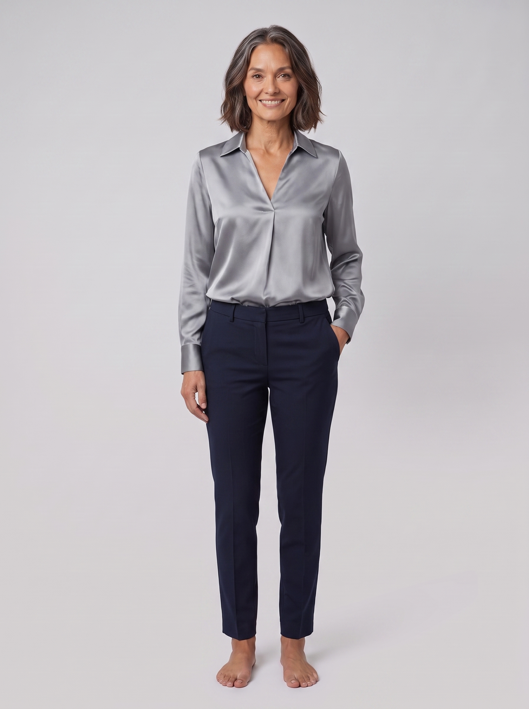 Lena metallic V-neck blouse in silver on model