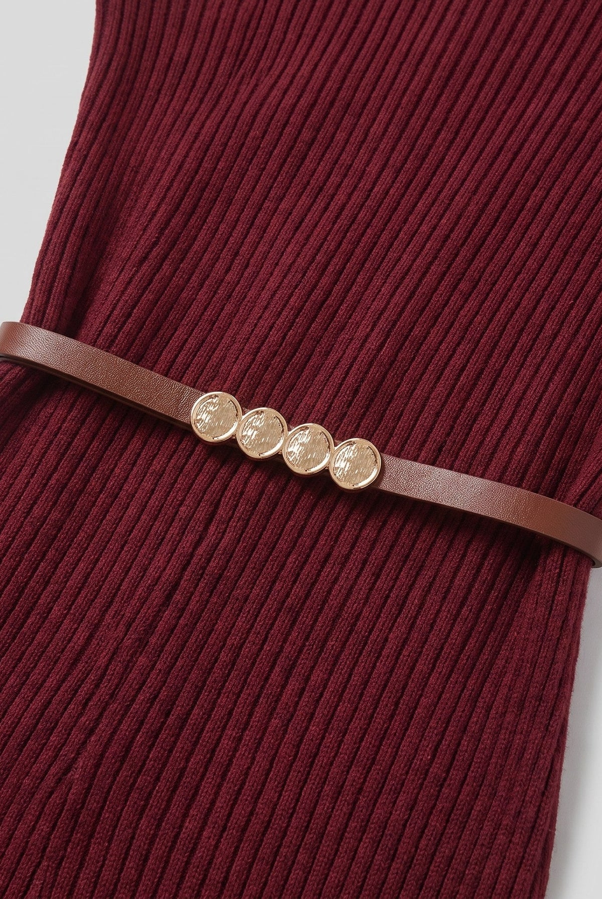 Liora turtleneck dress leather belt and rib texture close-up