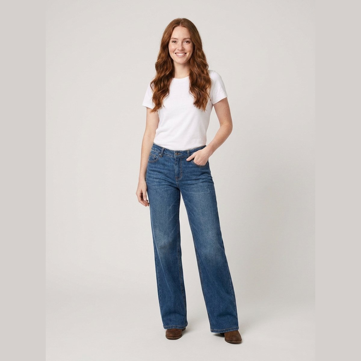 Maren high-rise wide-leg jeans in mid blue on model