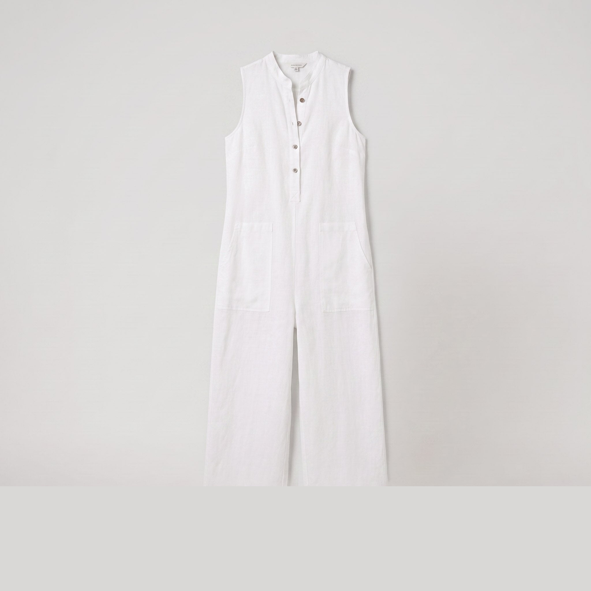 Mila sleeveless linen-blend jumpsuit in white, flat lay product shot