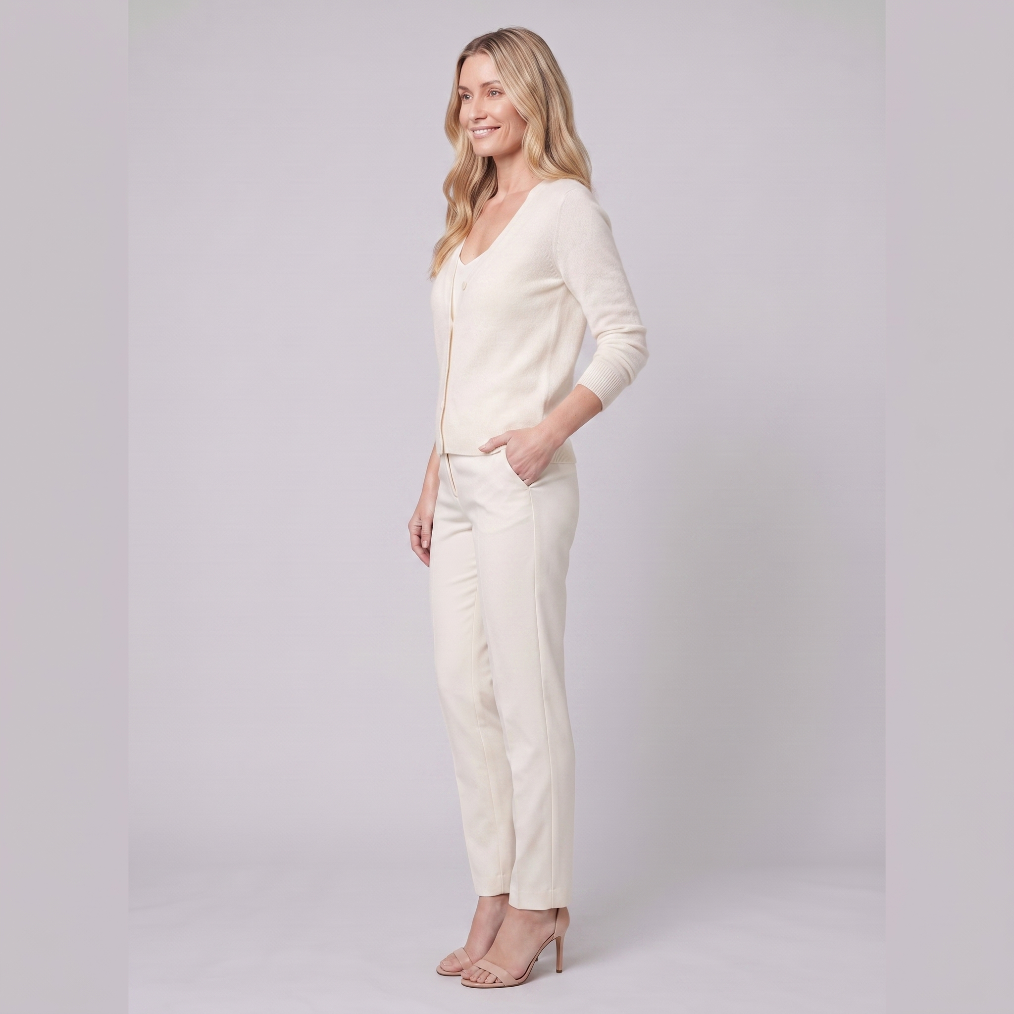 Nora long open-front cardigan in cream, side view on model