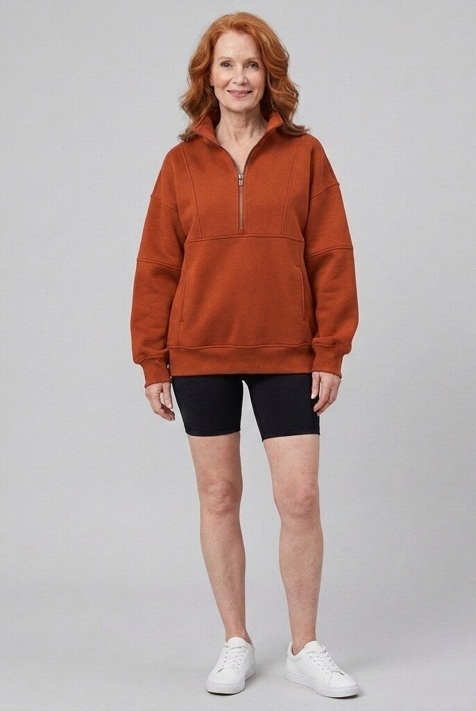 Paloma oversized half-zip sweatshirt in orange on model