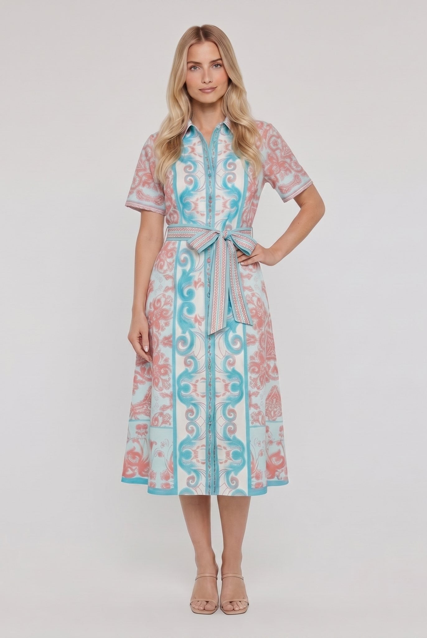 Women's white A-line collared midi dress with button front and tie belt, full-length model photo