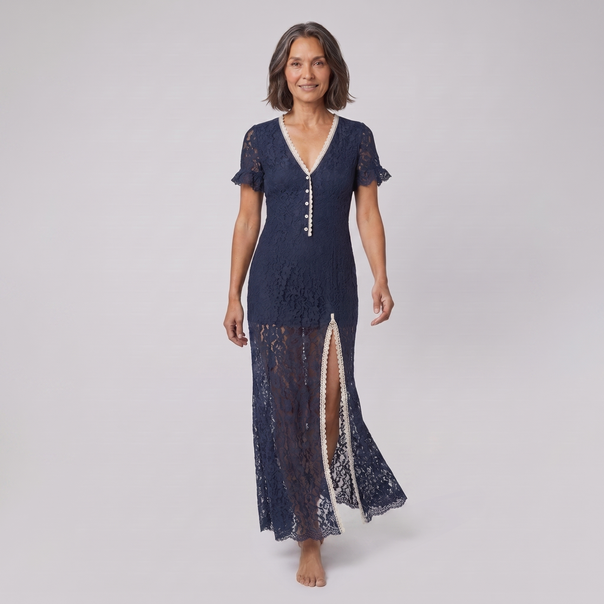 Bora Midi Dress in navy floral lace, model walking shot — walk