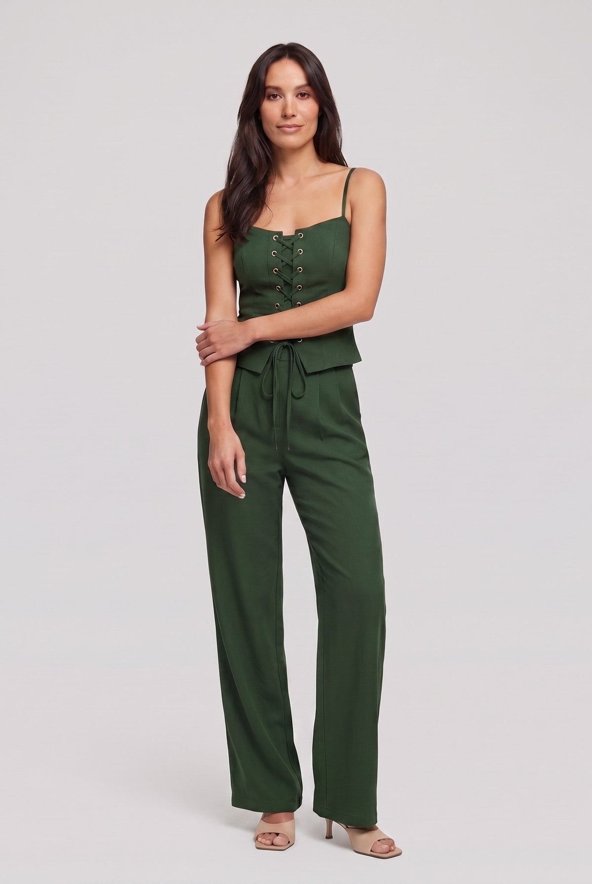 Forest green lace-up corset top and wide-leg trouser set, front view