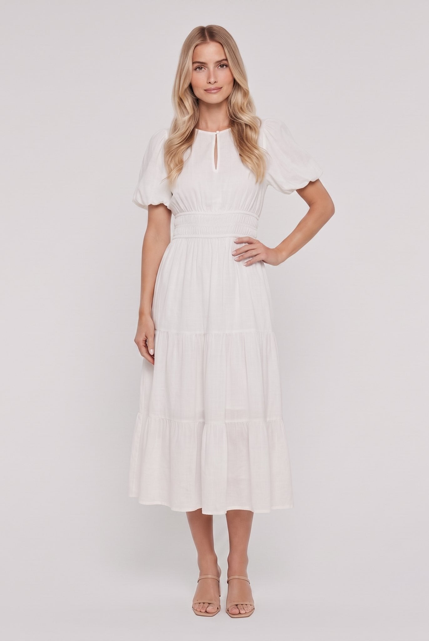 White lightweight cotton midi dress with balloon sleeves, front view on model