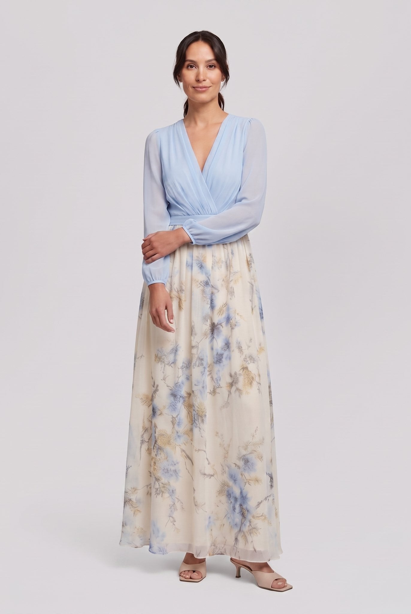 Floral maxi wedding guest dress, side pose on model