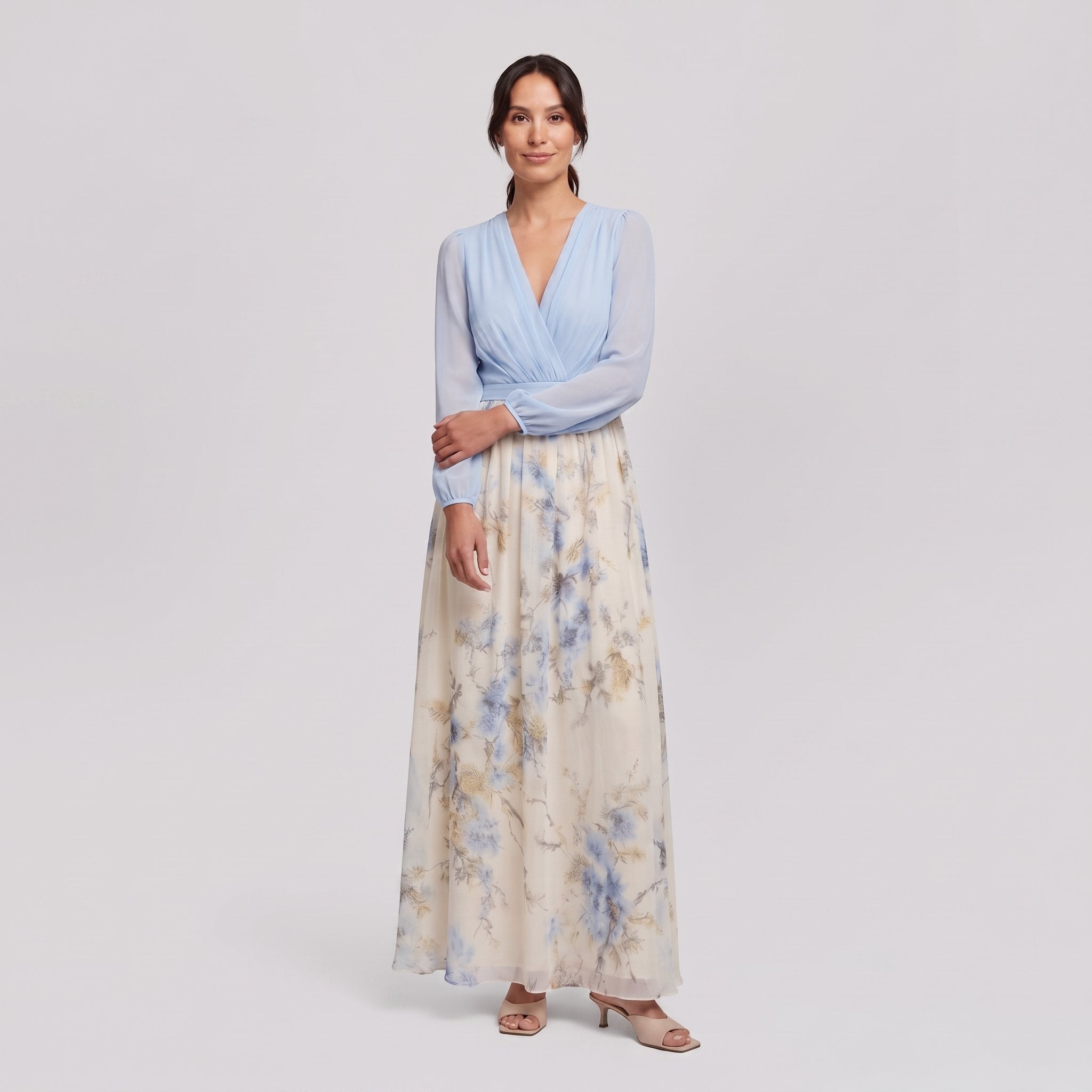 Floral maxi wedding guest dress, side pose on model