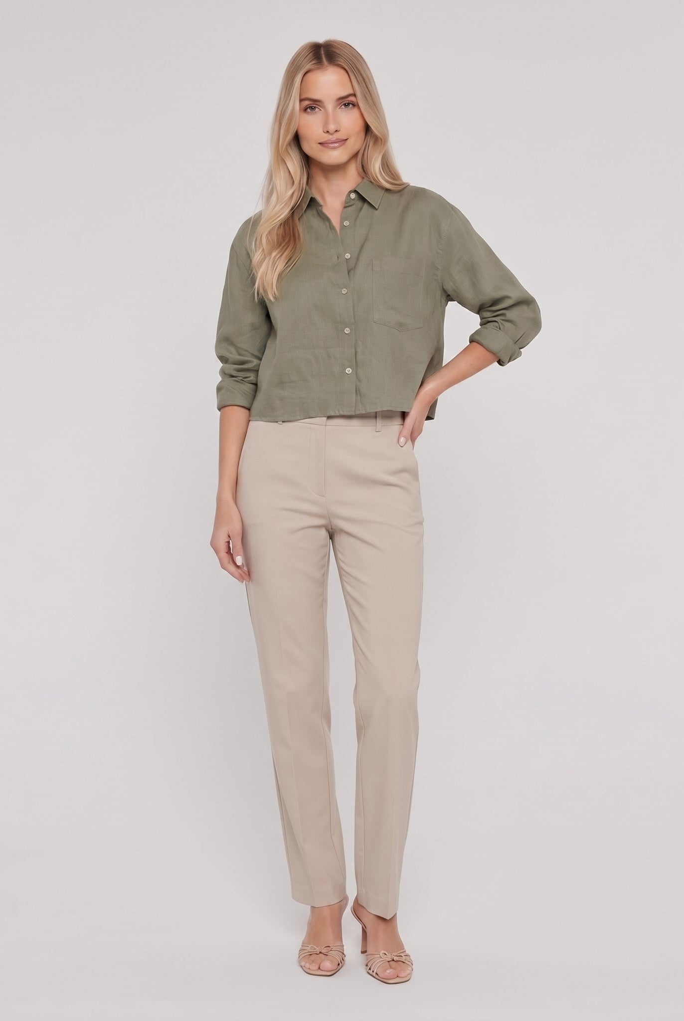 Model wearing forest green linen shirt - Cleo Women's Shirt