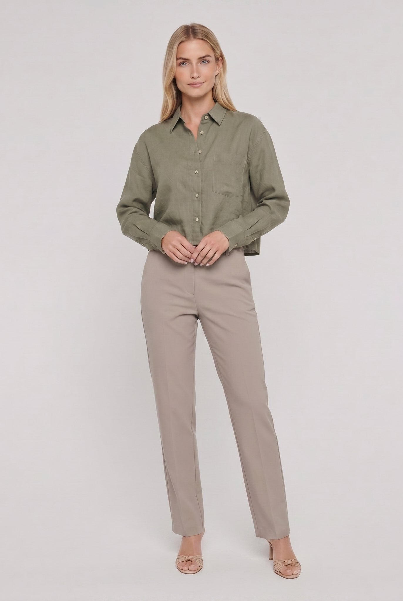 Model wearing forest green linen shirt front view - Cleo Women's Shirt