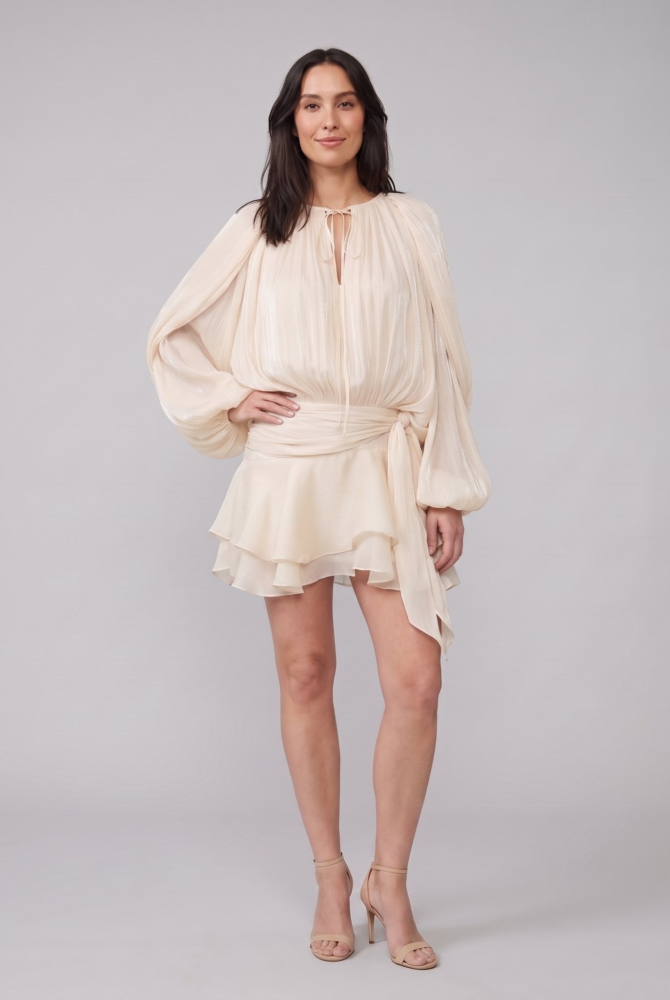 Cream ivory pleated chiffon mini dress with balloon sleeves and ruffled hem, front view