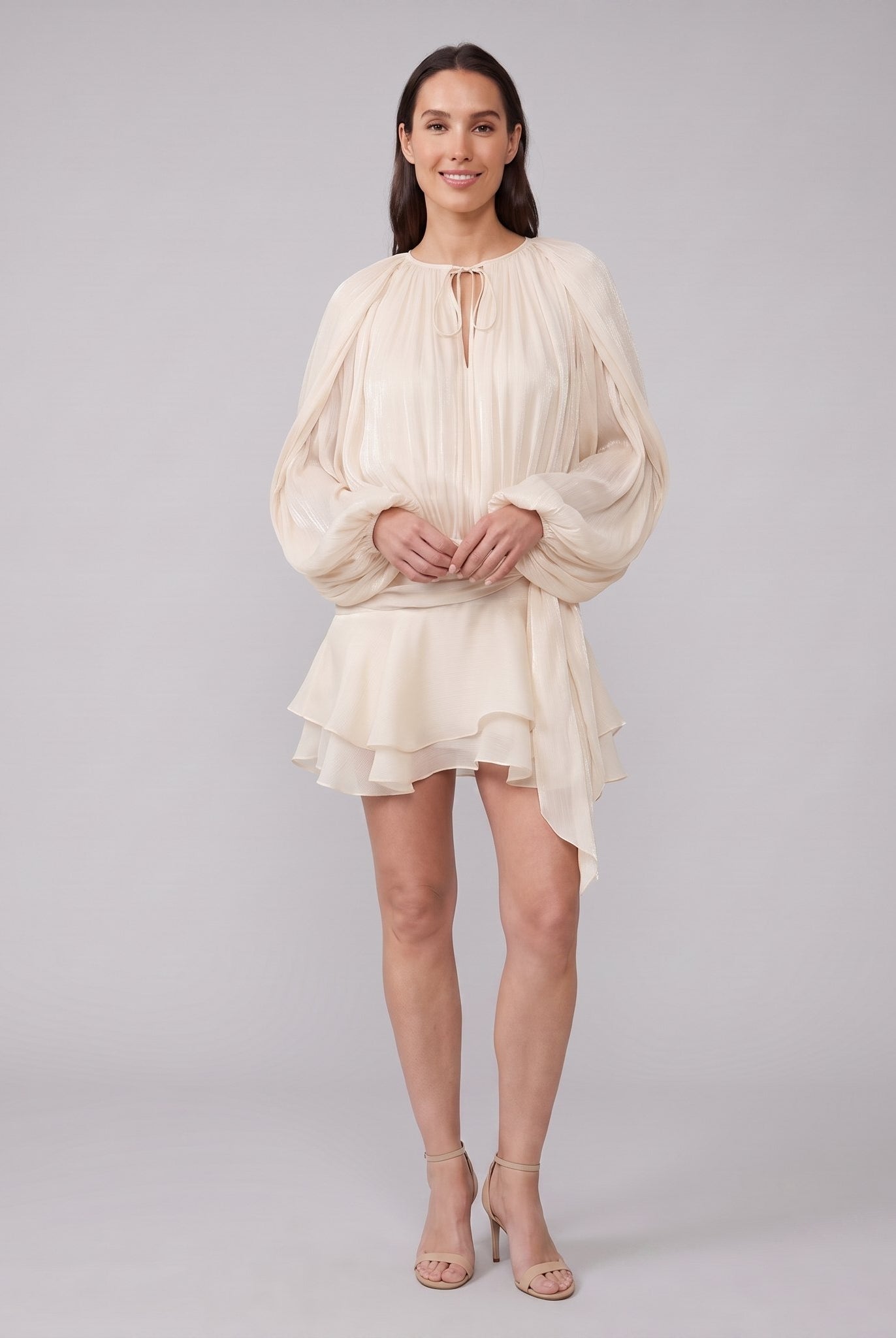 Cream ivory pleated chiffon mini dress, front view hands clasped