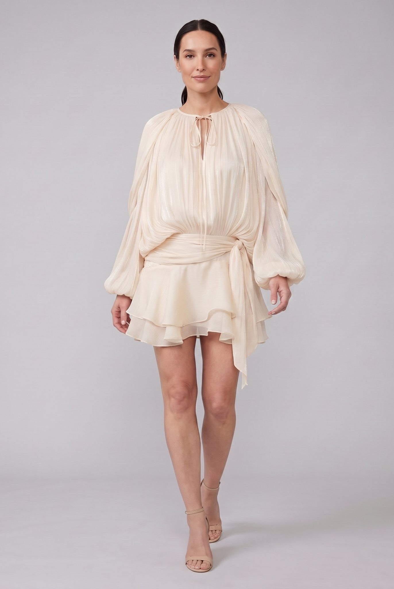 Cream ivory pleated chiffon mini dress, walking pose
