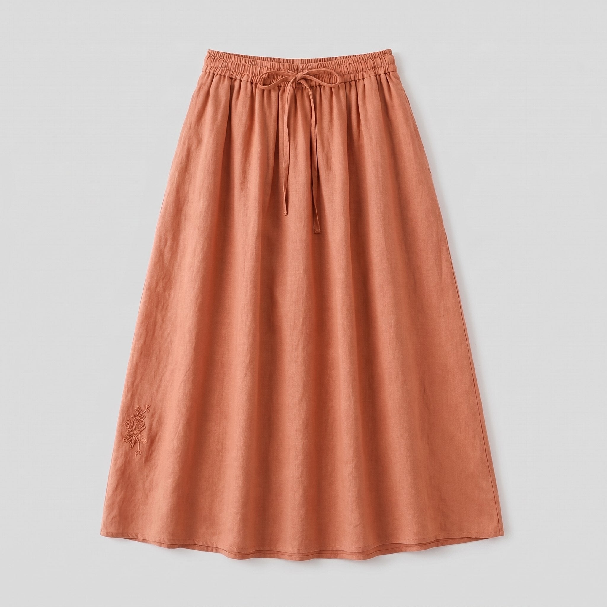 Peach linen A-line drawstring skirt, product flat-lay