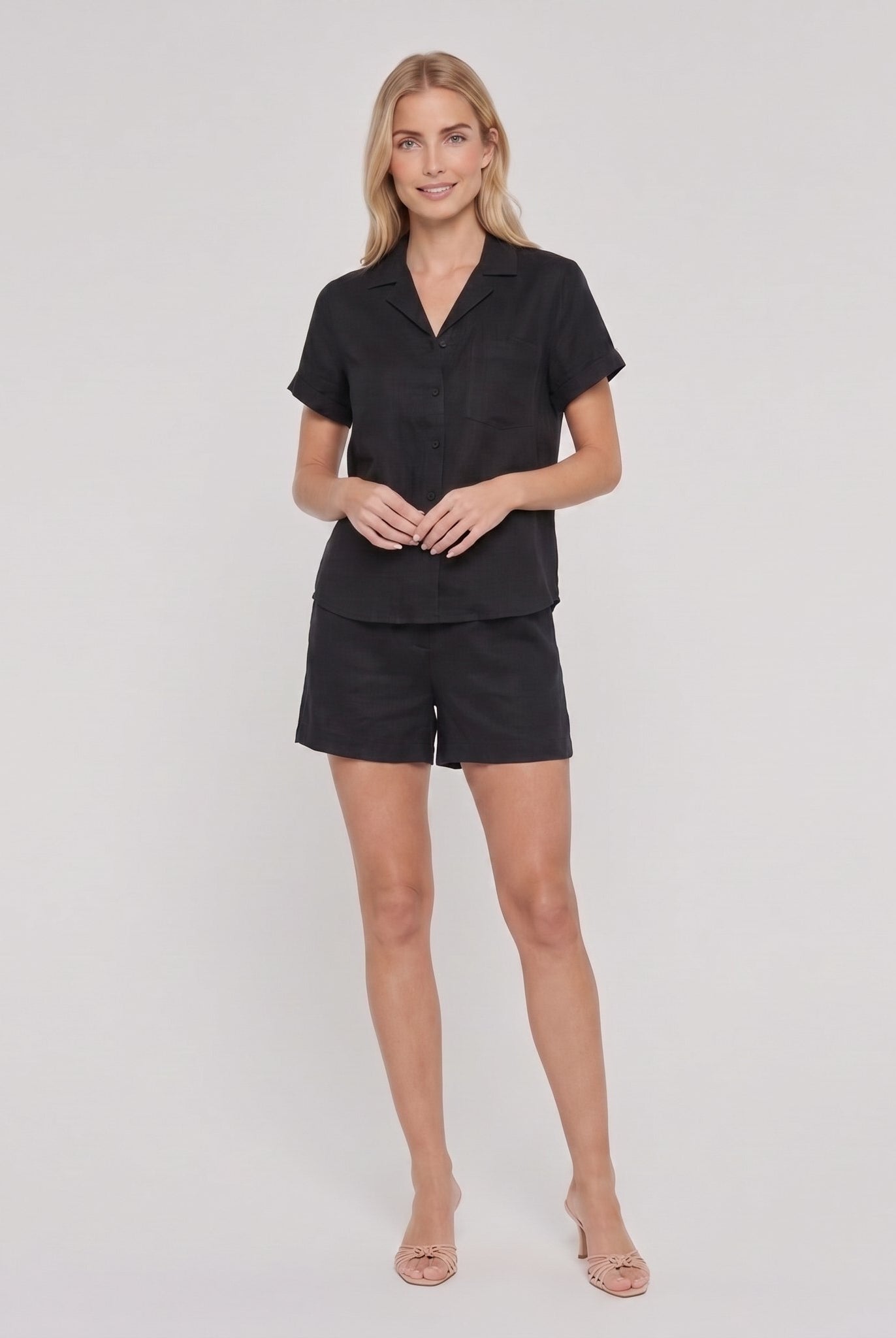Black linen camp-collar shirt and high-waist shorts set, front view on model