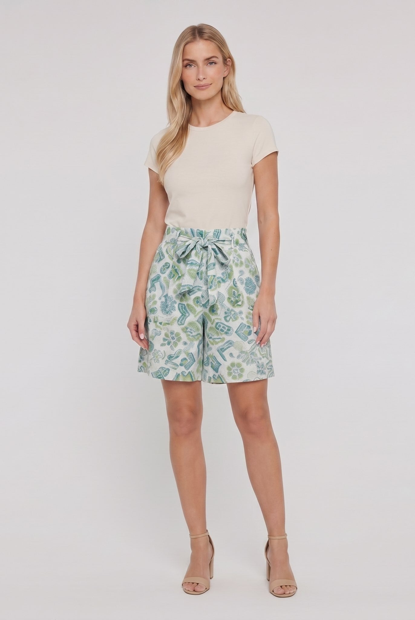 Pamela Boutique mint floral pleated shorts, model view