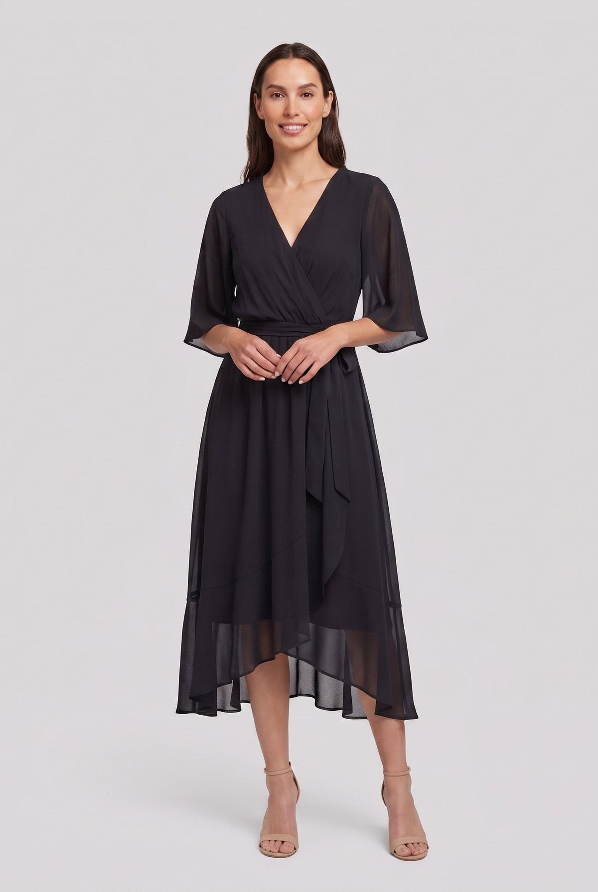 Black Gina wrap midi dress with V-neck and flutter sleeves on model