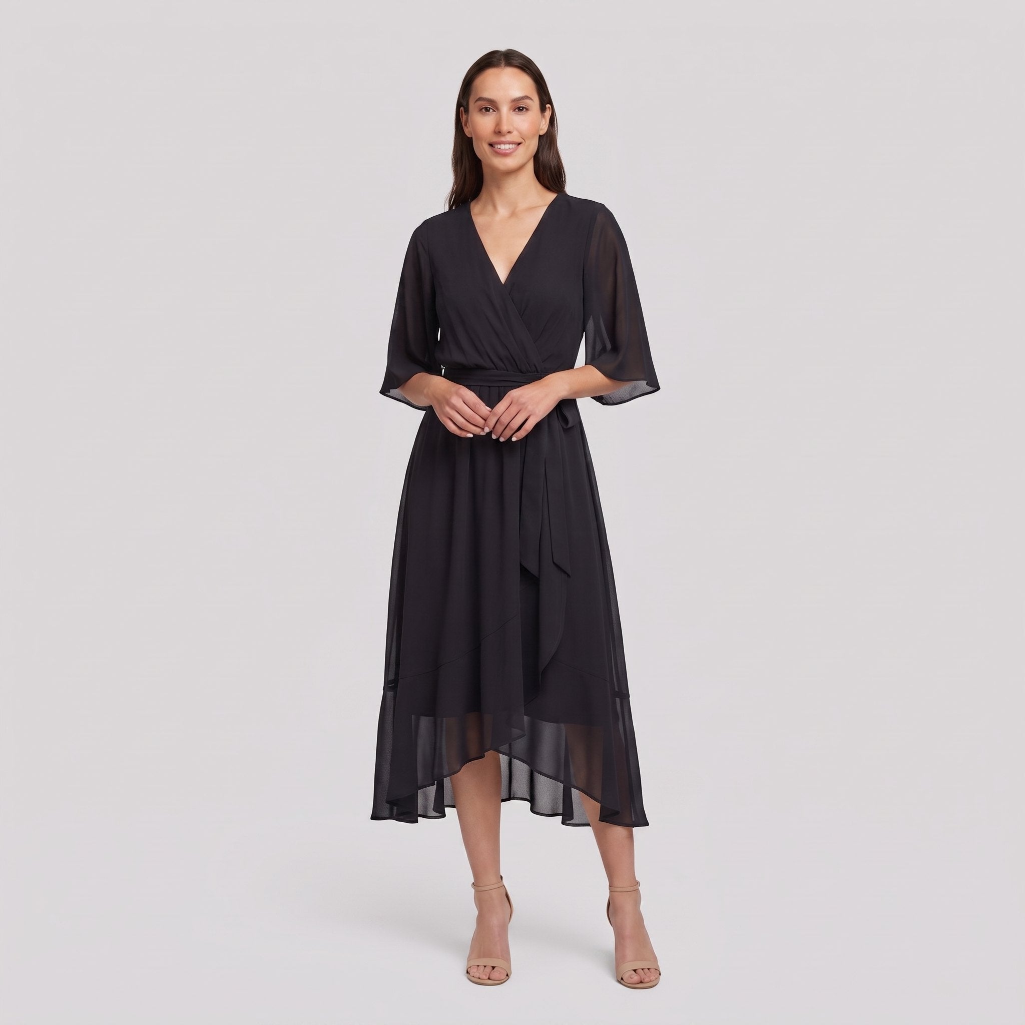 Black Gina wrap midi dress with V-neck and flutter sleeves on model
