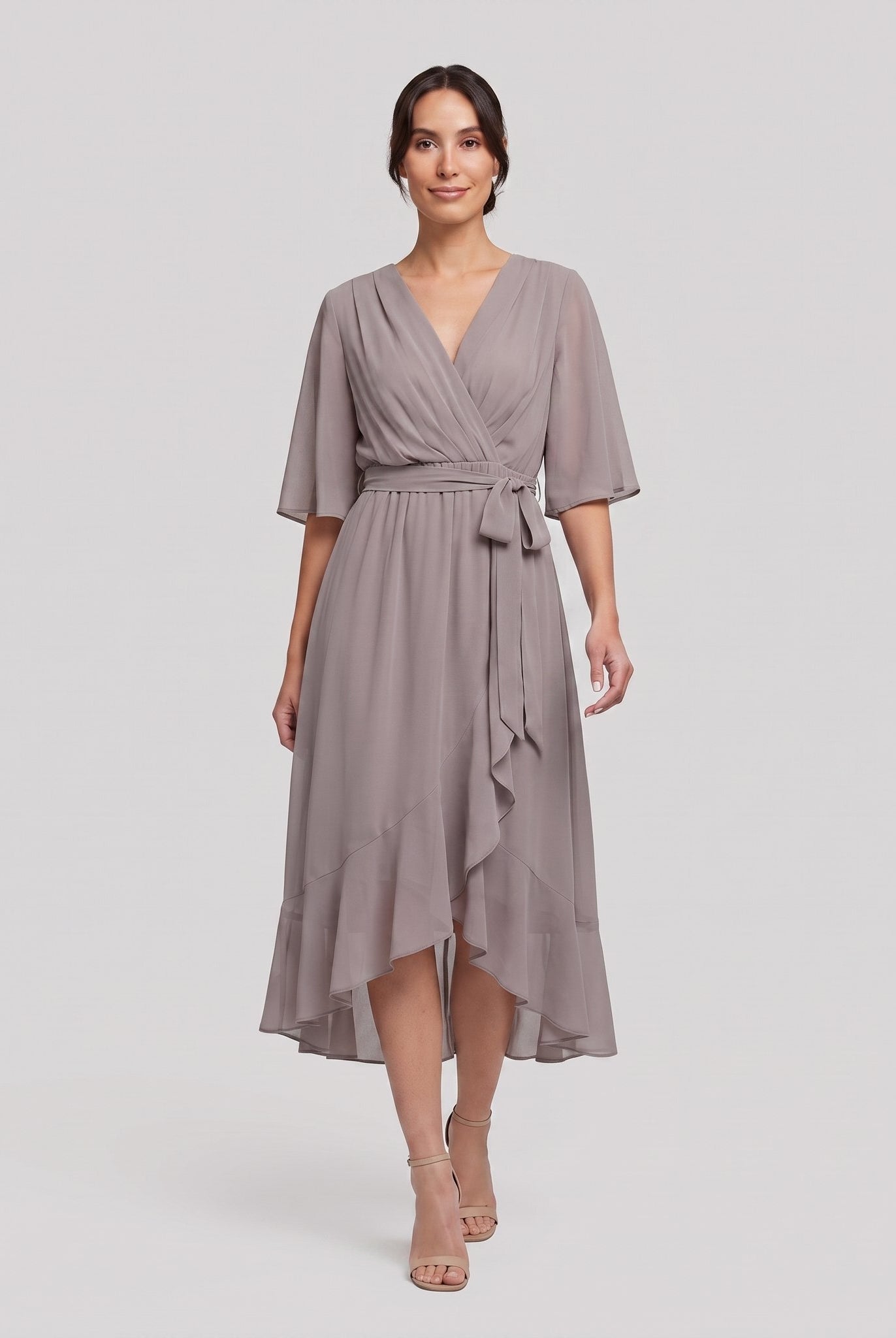 Taupe grey Gina wrap midi dress with V-neck and flutter sleeves on model