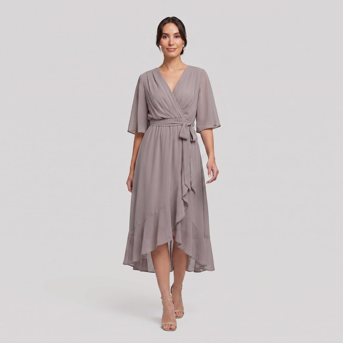Taupe grey Gina wrap midi dress with V-neck and flutter sleeves on model