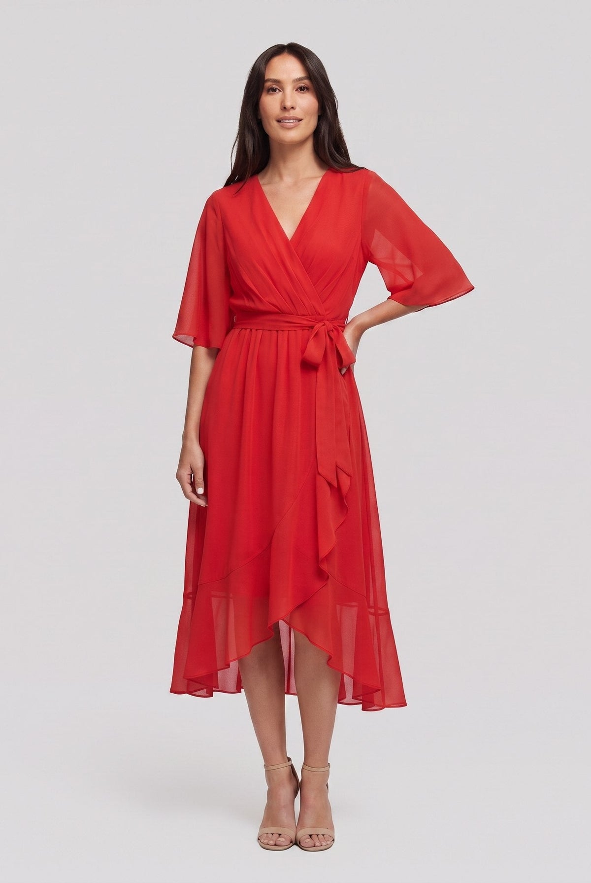 Red Gina wrap midi dress with V-neck and flutter sleeves on model