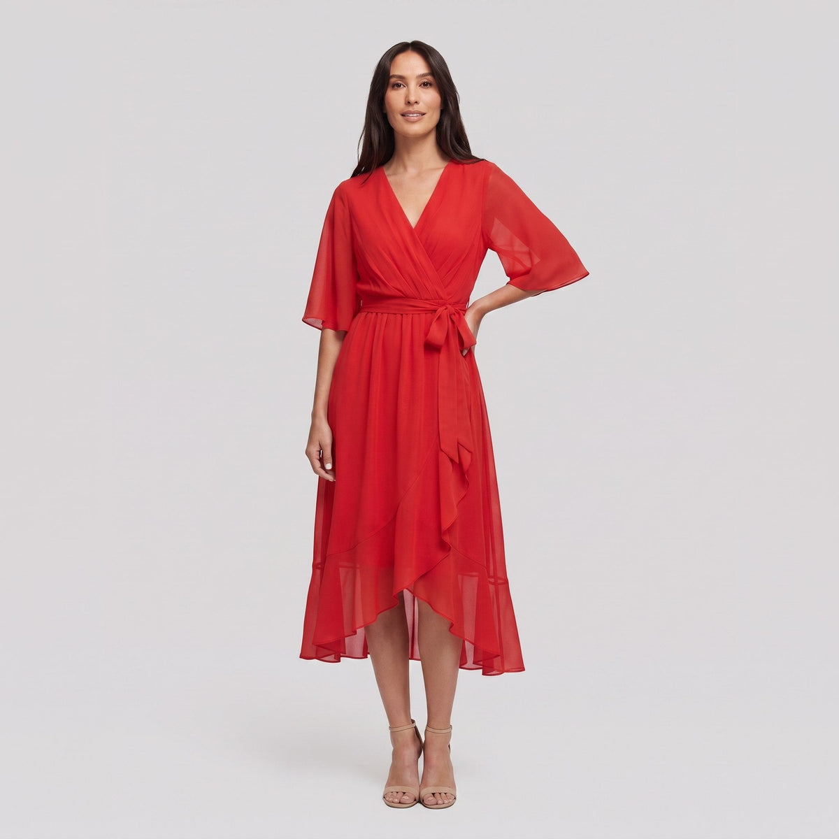 Red Gina wrap midi dress with V-neck and flutter sleeves on model