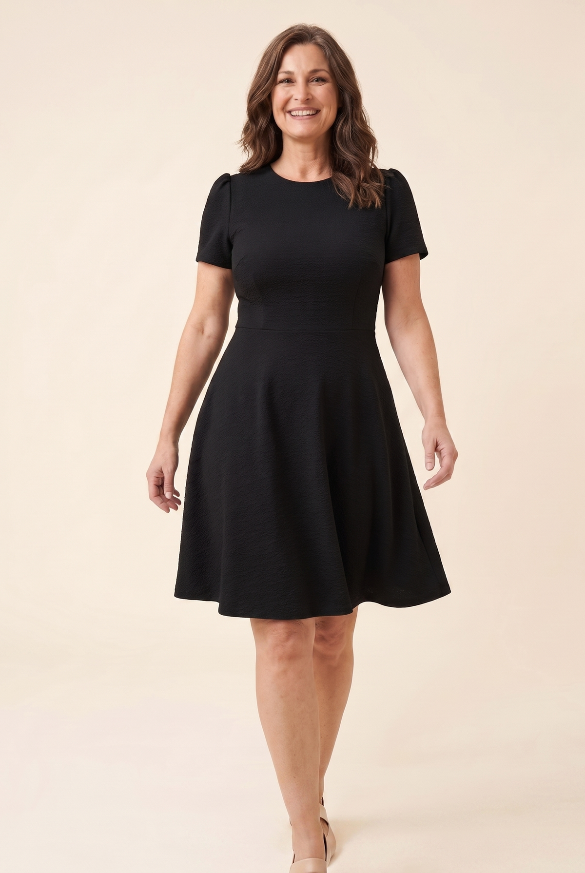 Ivy Midi Dress in black textured crepe, model walking shot — walk