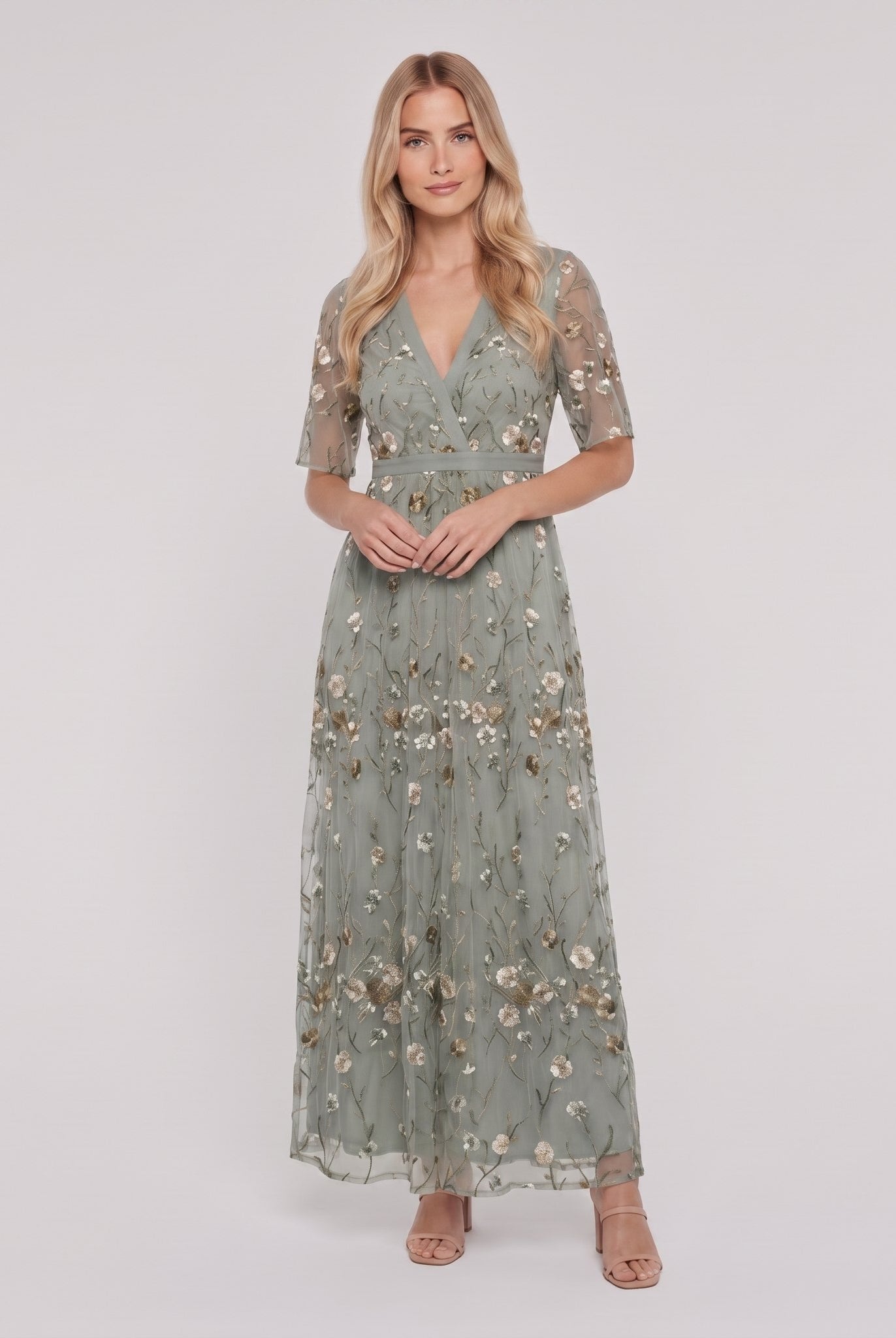 Sage green floral maxi dress with V-neck on model