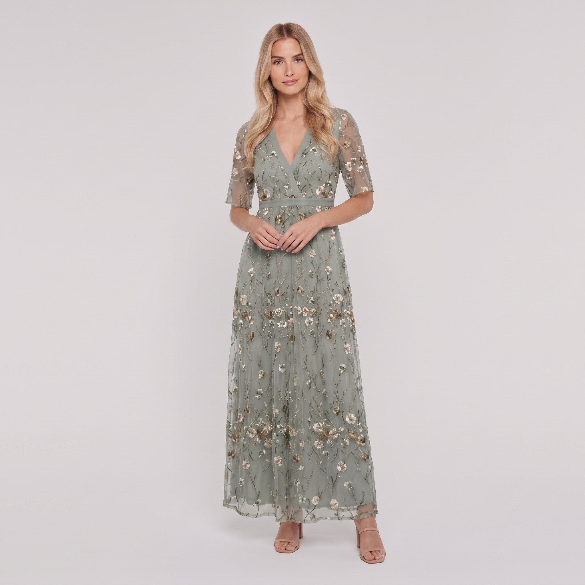 Sage green floral maxi dress with V-neck on model