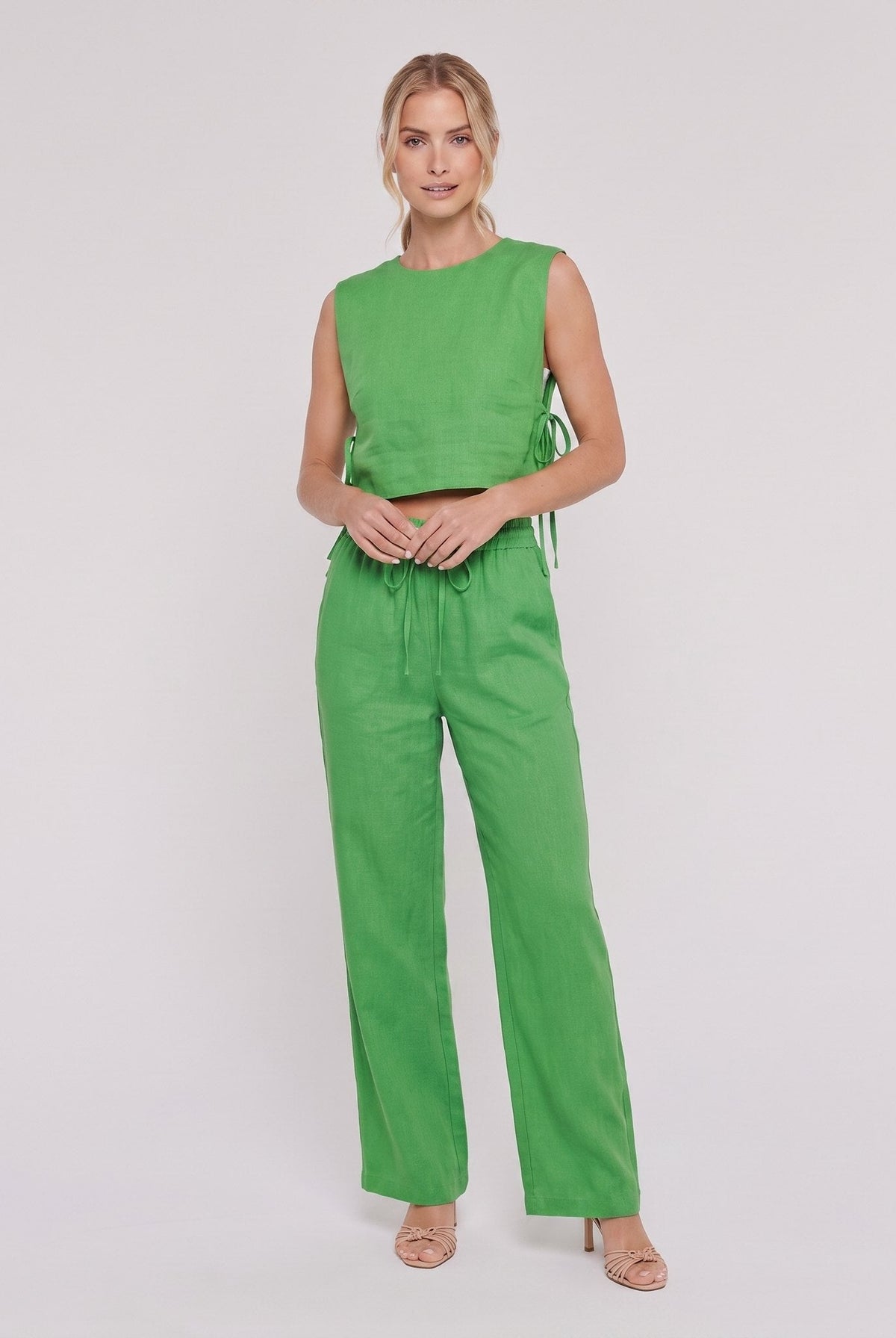 Bright green linen two-piece set, sleeveless crop tank and wide-leg trousers