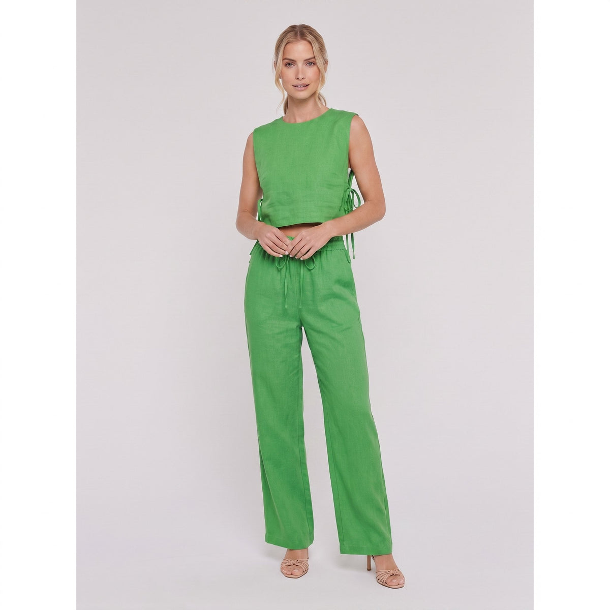 Bright green linen two-piece set, sleeveless crop tank and wide-leg trousers