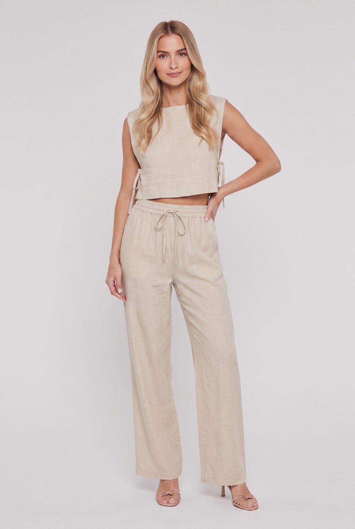 Natural oatmeal khaki linen two-piece set, sleeveless crop tank and wide-leg trousers, front view