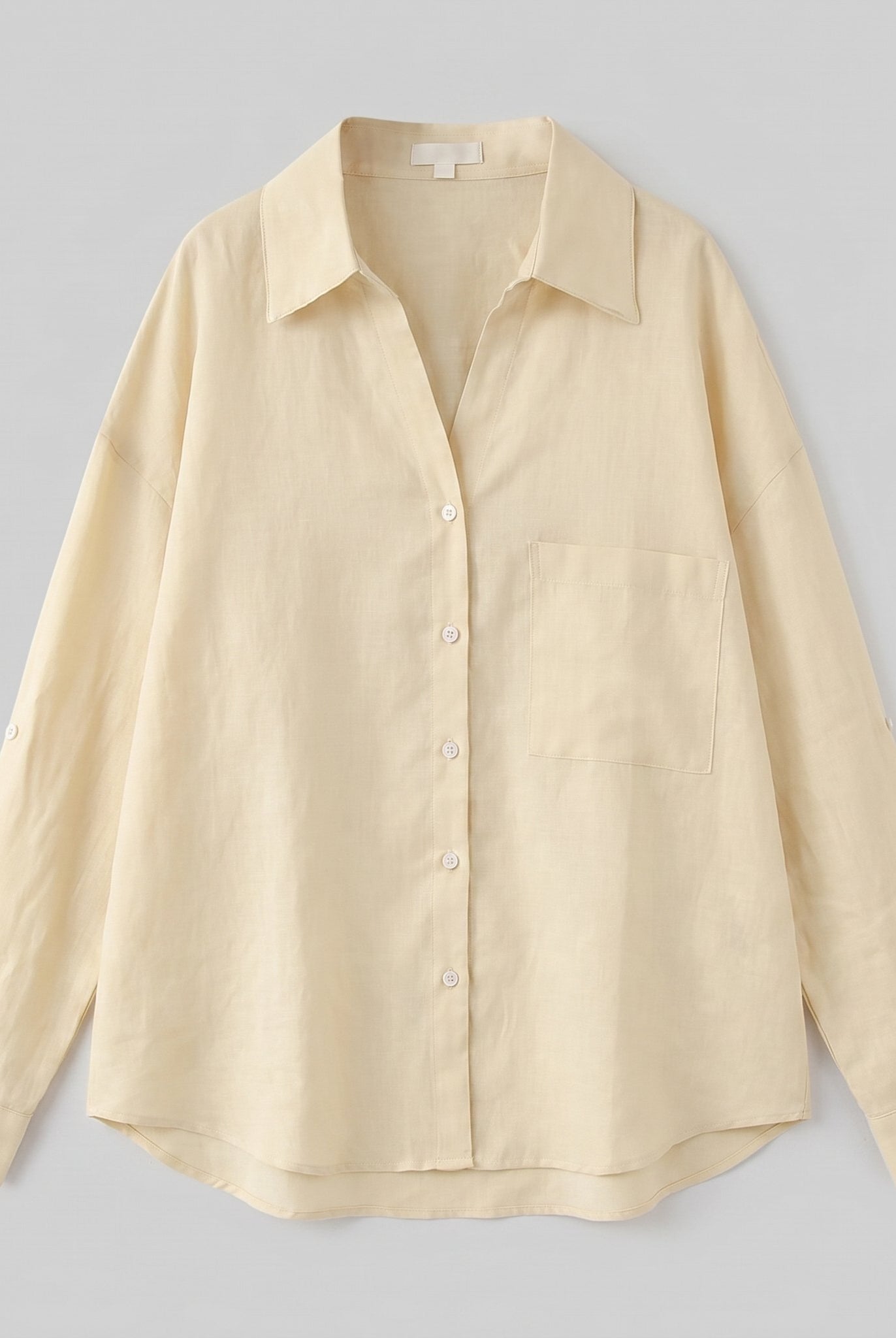 Lino Classic Shirt product flat-lay - pale yellow oversized linen shirt detail